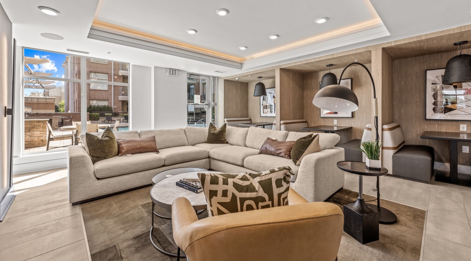 a clubroom with a couch, table and chair